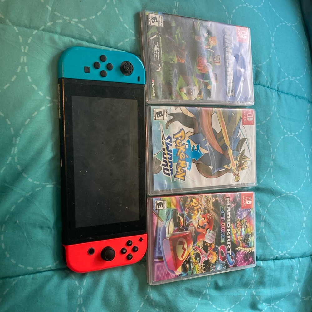 Nintendo Switch Console with Blue and Red Joy-Con